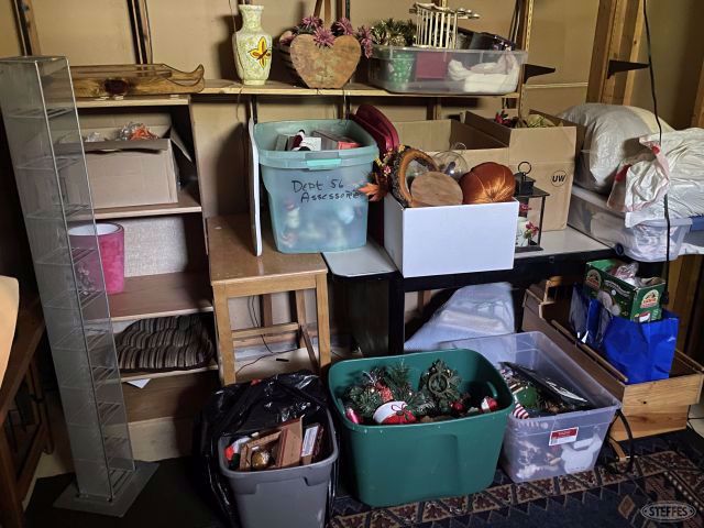 Contents of storage room to include Christmas decorations, Electric fireplace, desk & chair, #2974